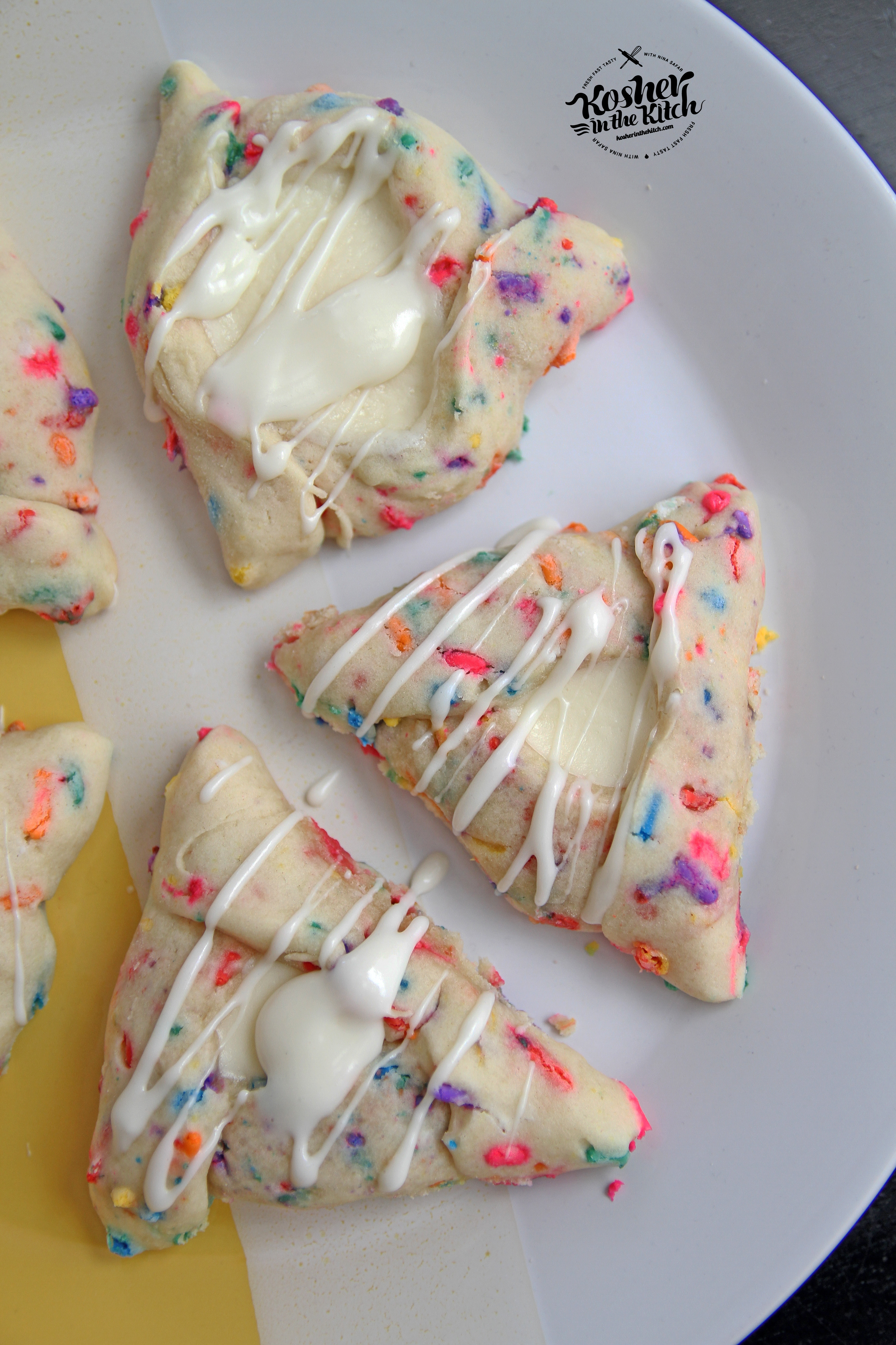 Funfetti Hamantaschen with Cheesecake Filling