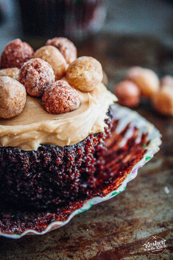 Chocolate Cupcake with Peanut Butter Frosting topped with Reese's Puffs Cereal