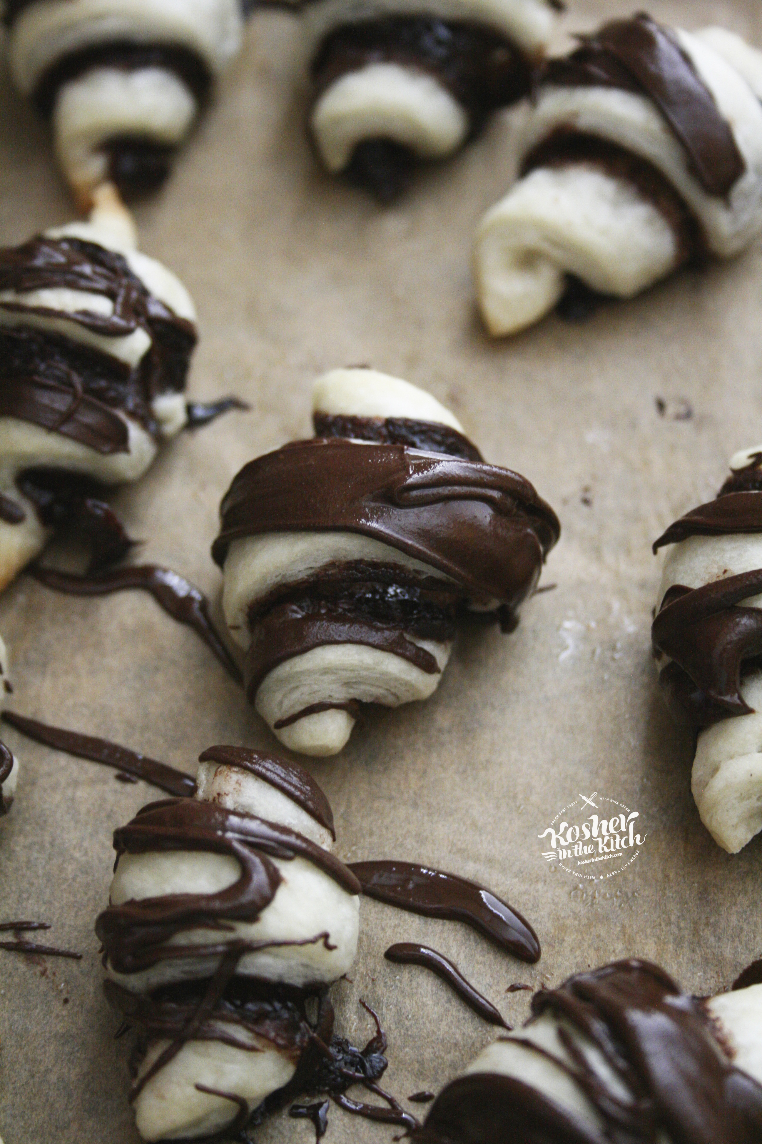 Chocolate Rugelach with Chocolate Drizzled on Top