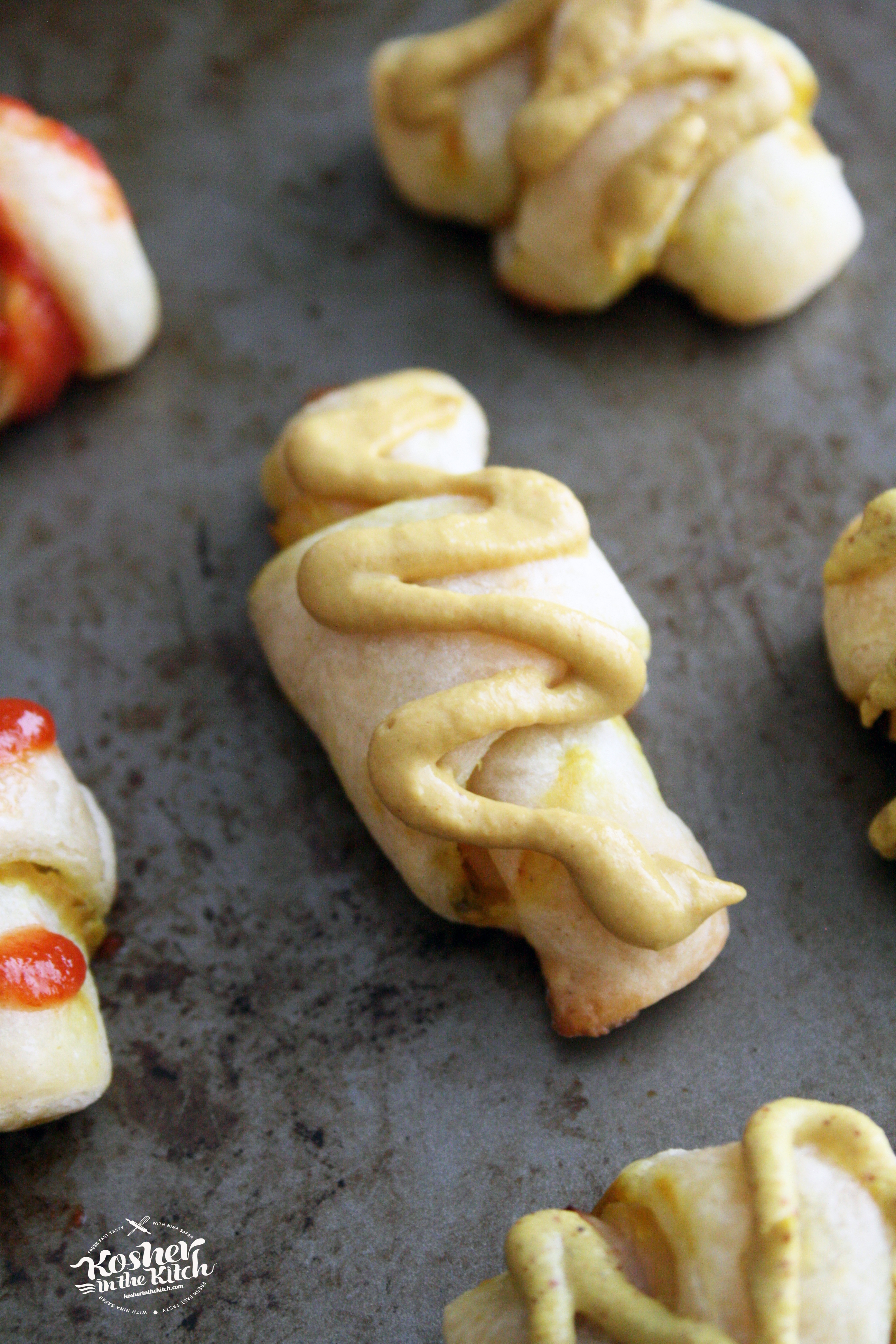 Top baked rugelach with mustard