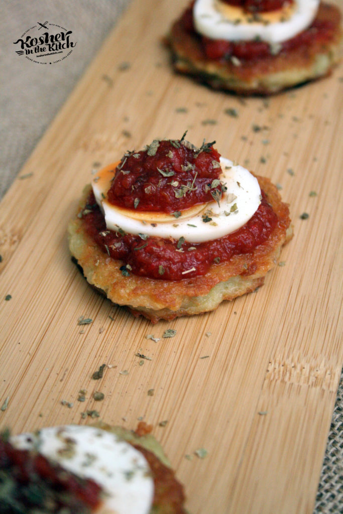 Shakshuka latkes with sliced hard boiled eggs