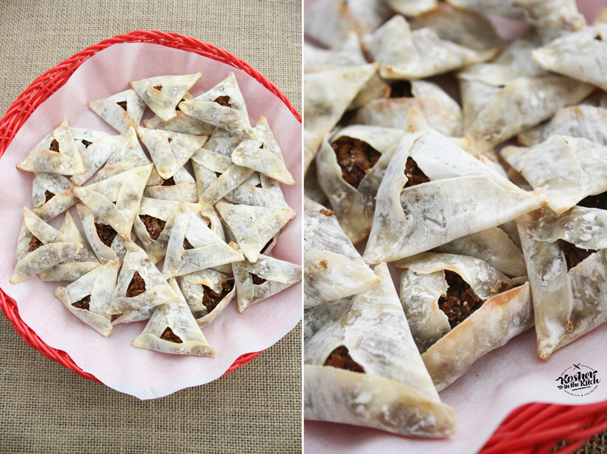 Layer baked nacho hamantaschen on a platter lined with parchment paper