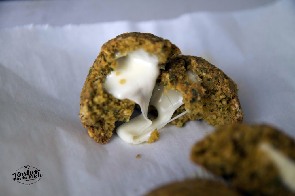 Falafel balls stuffed with mozzarella, baked